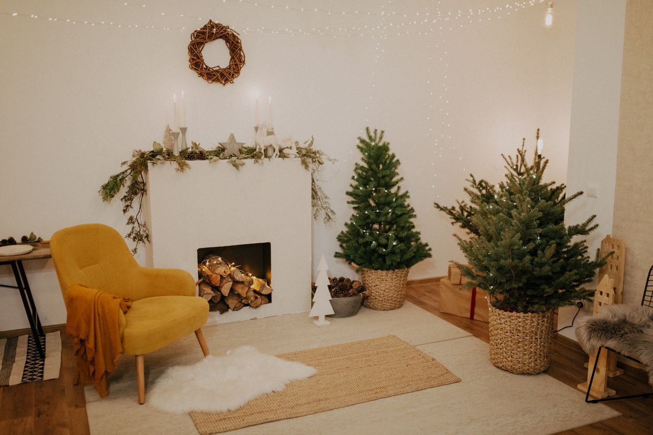The Art of Drawing Readers In: Your attractive post title goes here Warm and inviting living room with Christmas decorations, featuring a fireplace and festive decor.